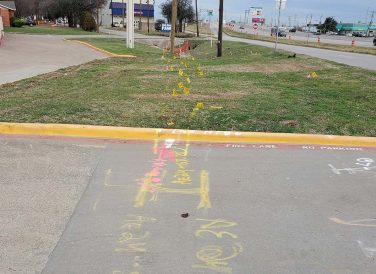 flag and street markings for Diamond Interchange right of way